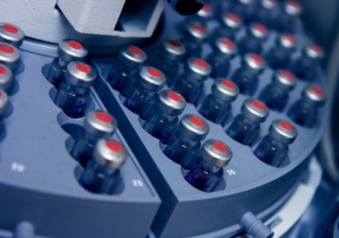 Capped vials on an analysis autosampler, selective focus