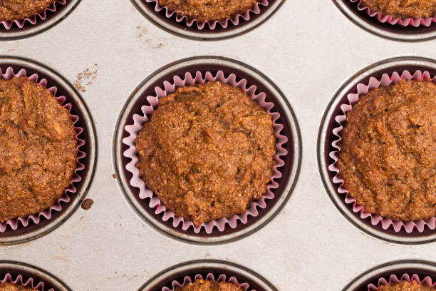 istock A Background of Apple Cinnamon Pecan Muffins in their Pan 926742196