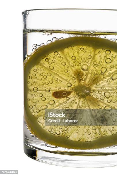 Glass Of Fizzy Water With Lemon Slice Stock Photo - Download Image Now - Carbonated Water, Clipping Path, Close-up