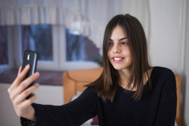 istock Girl with mobile phone 926748696
