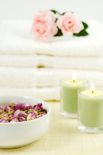 istock Dried Roses, Towels and Lit Candles 92675140