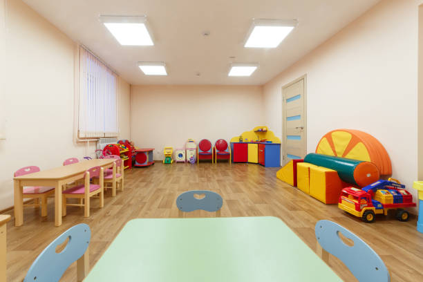 istock Spacious light pink colored game room with in the kindergarten 926752930