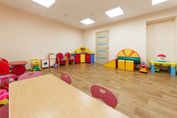 istock Spacious light pink colored game room with in the kindergarten 926752970