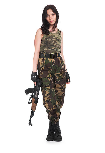 istock The beautiful girl with a  automatic rifle 92675668