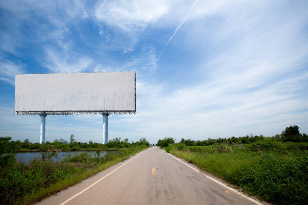 istock blank billboard on the sideway in the park. image for copy space 926757508