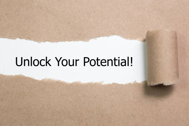 istock The text Unlock Your Potential appearing behind torn paper. 926757638
