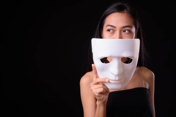 istock Young beautiful Asian woman against black background 926757768