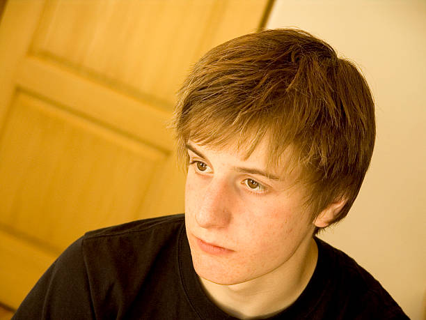 istock thinking teen boy portrait 92675978