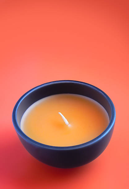 istock Colorful candle with bright orange background 92676129
