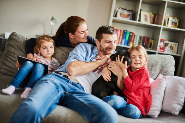 istock Family with children and a dog 926762786