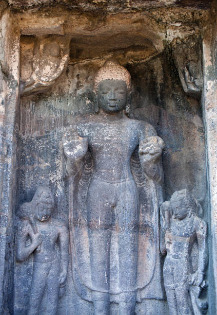 istock Ancient bas-relief with Buddha in Ajanta caves, India 926764088