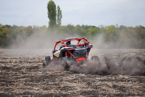 istock Leaving a quad bike with driver in plowed field 926764130