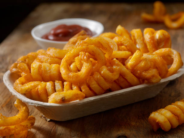 istock Spicy Curly Fries with Ketchup 926770436