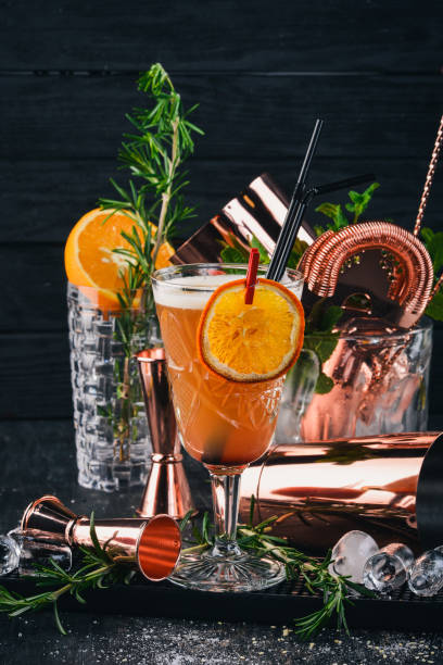 istock Alcohol Cocktail Mai Thai. On a black wooden background. 926771488