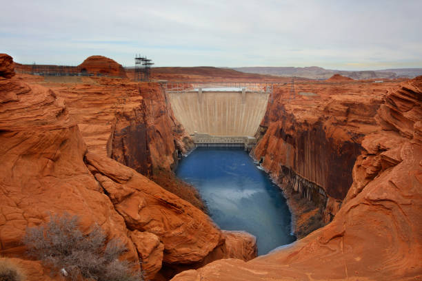 Glen Canyon Dam Glen Canyon Dam at the Glen Canyon National Recreation Area. glen canyon dam stock pictures, royalty-free photos & images