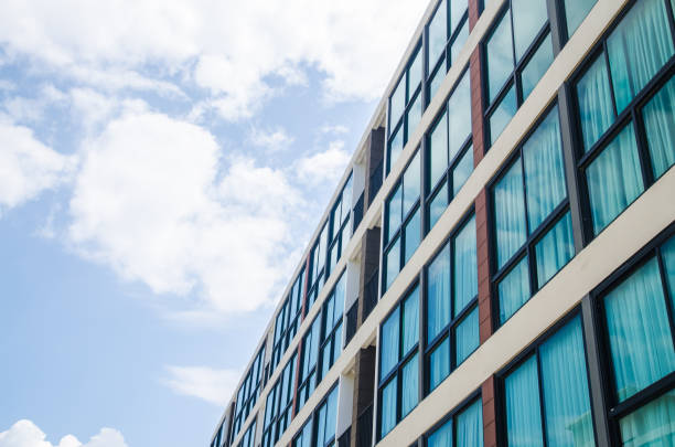 istock modern building with white cloud vintage tone 926783638