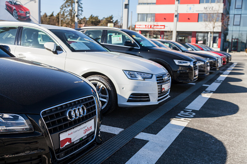 Nuernberg / Germany - February 25, 2018: Audi cars stands on parking lot near audi car dealer. Audi AG is a German automobile manufacturer that designs, engineers, produces, markets and distributes luxury vehicles.