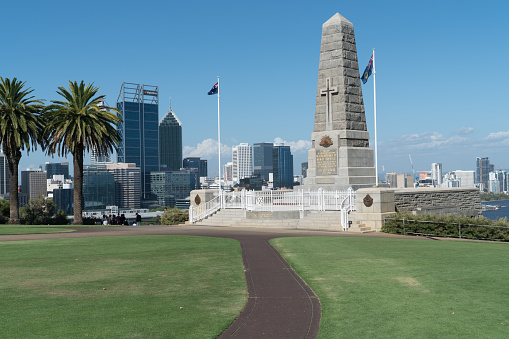 Perth, Australia - January 21, 2018: ANZAC memorial with the skyline of Perth on January 21, 2018 in Western Australia
