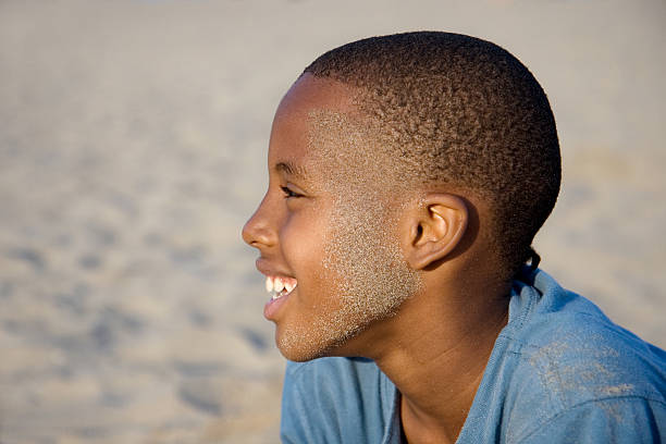 istock child at the beach falling for sand 92679414