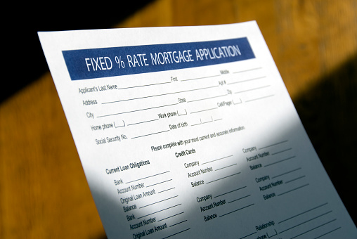 A mock up of a mortgage application form. Selective focus on banner. Part of a form series.