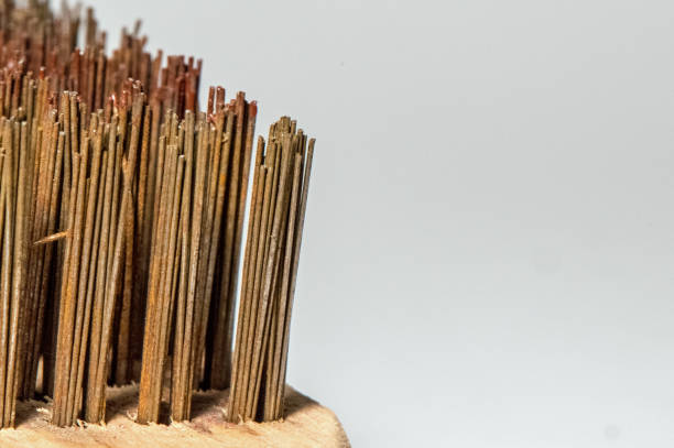 Old tools have a history. This old steel brush with weathered hair has already removed a lot of rust in its life.