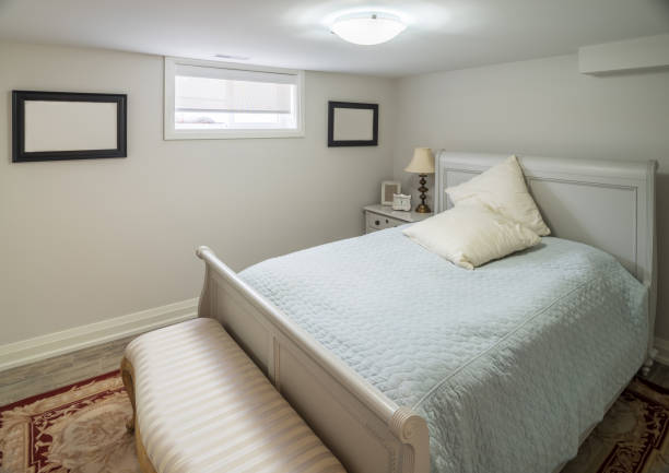 Interior of modern urban Bungalow basement residence with  bedroom.
