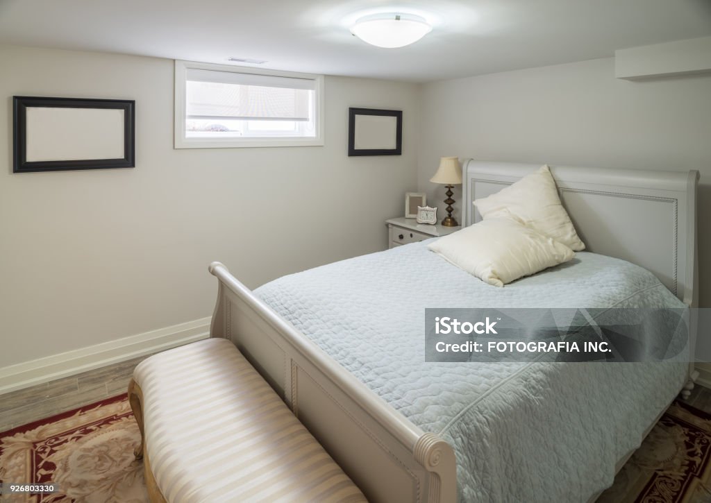 Bungalow Interior of bedroom Interior of modern urban Bungalow basement residence with  bedroom. Basement Stock Photo