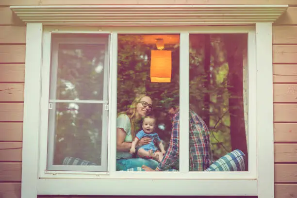 Photo of Family looking out of the window