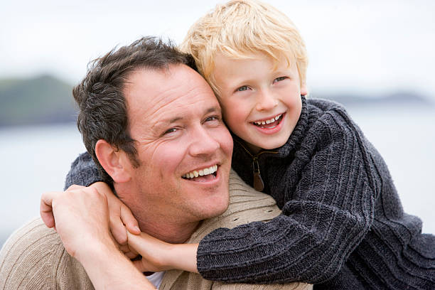 istock Father and son smiling to the right 92680665