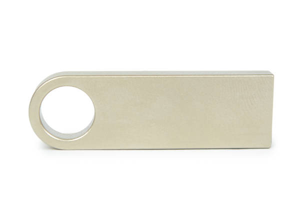 istock USB memory stick in hand. Isolated on white background. Data transfer, digital drive, backup and secure 926806924