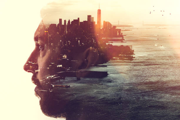 New York City Mind State Concept Image The profile of a woman's head, a New York City skyline double exposed with the image.  A conceptual depiction of smart cities, and the people who shape them. smart city photos stock pictures, royalty-free photos & images