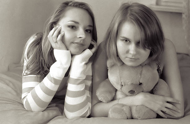 istock Girls and a Teddy bear 92681446