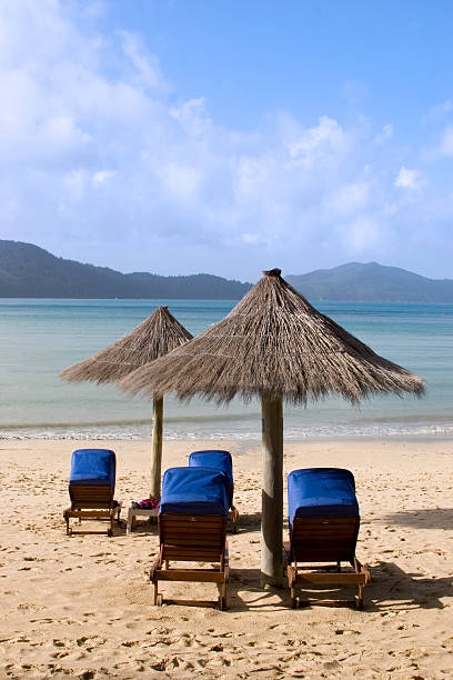 istock Sun umbrellas at beach resort 92681518