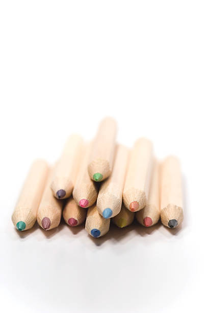 istock Wooden color pencils in stack isolated on white 92682478