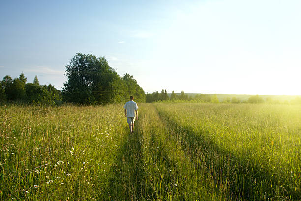 istock one man and field of summer grass 92682674