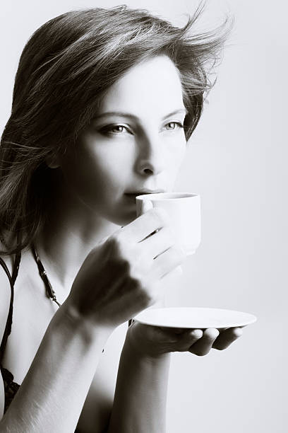 istock Beautiful woman drinking coffee 92682681