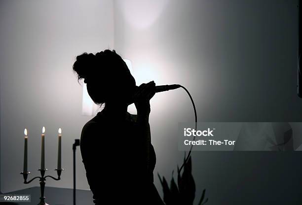 Singing In The Dark Stock Photo - Download Image Now - In Silhouette, Singer, One Woman Only