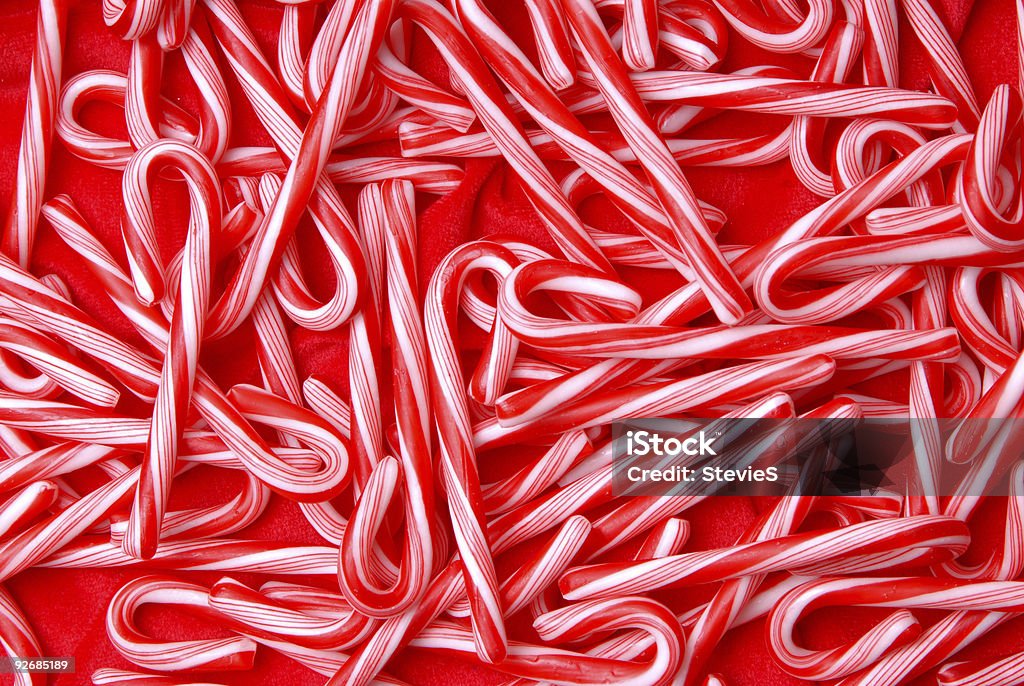 Weihnachten Zuckerstangen auf rotem Samt - Lizenzfrei Bildhintergrund Stock-Foto