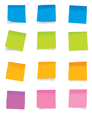 Arrangements of colorful sticky notes on a white wall