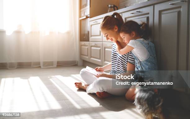 Happy Mothers Day Child Daughter Congratulates Her Mother And Read Postcard Stock Photo - Download Image Now