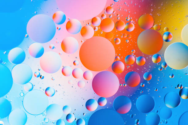 istock mixing water and oil, beautiful color abstract background based on circles and ovals 926873314