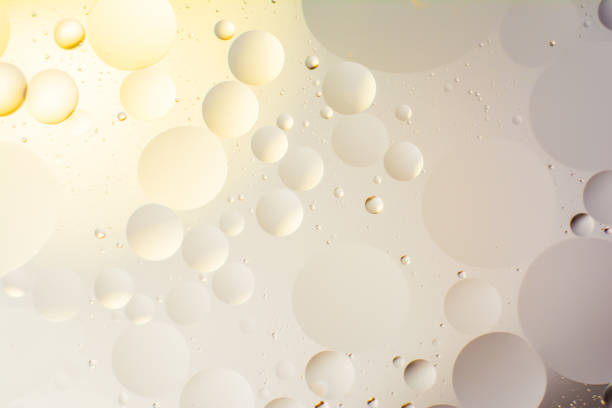 mixing water and oil, beautiful color abstract background based on circles and ovals stock photo