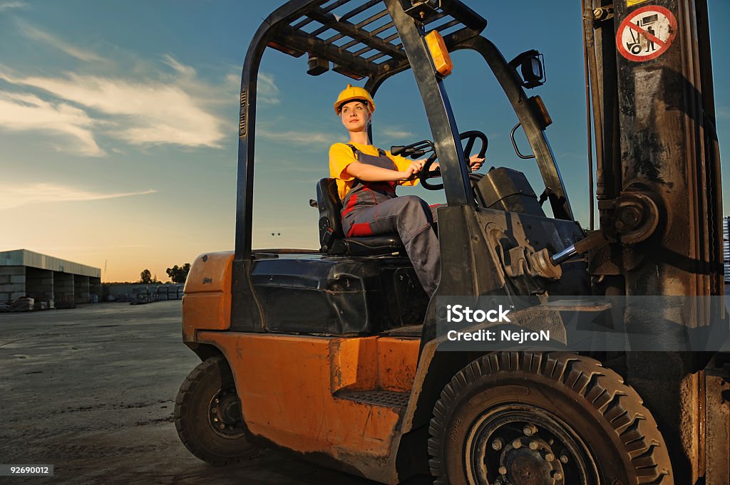 A worker operating a forklift at dusk Factory worker

Similar images
[url=/file_closeup.php?id=9676645][img]/file_thumbview_approve.php?size=1&id=9676645[/img][/url] [url=/file_closeup.php?id=9574817][img]/file_thumbview_approve.php?size=1&id=9574817[/img][/url] [url=/file_closeup.php?id=9564413][img]/file_thumbview_approve.php?size=1&id=9564413[/img][/url] [url=/file_closeup.php?id=9574844][img]/file_thumbview_approve.php?size=1&id=9574844[/img][/url] [url=/file_closeup.php?id=9564395][img]/file_thumbview_approve.php?size=1&id=9564395[/img][/url] [url=/file_closeup.php?id=9564398][img]/file_thumbview_approve.php?size=1&id=9564398[/img][/url] [url=/file_closeup.php?id=9751477][img]/file_thumbview_approve.php?size=1&id=9751477[/img][/url]  Forklift Stock Photo