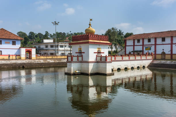 istock Shrine reflected in pond at Shree Omkareshwara Temple, Madikeri India. 926904382
