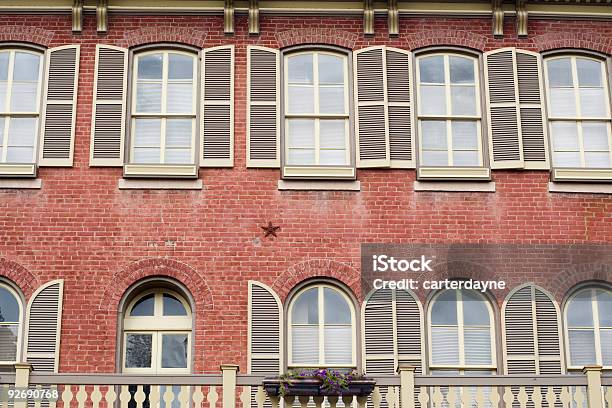 Historical Brick Building With Shutters Stock Photo - Download Image Now - Saint Charles - Missouri, Missouri, St. Louis - Missouri
