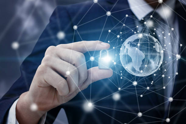 istock Businessman puts protection in a network with a lock. 926917676