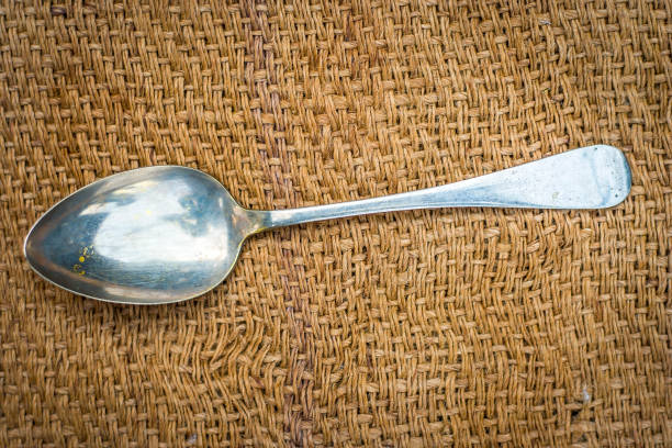 istock Vintage brass spoon on gunny bag. 926918218