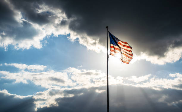 istock God Beams and Sun burst Beams down from Perfect American Flag 926921852