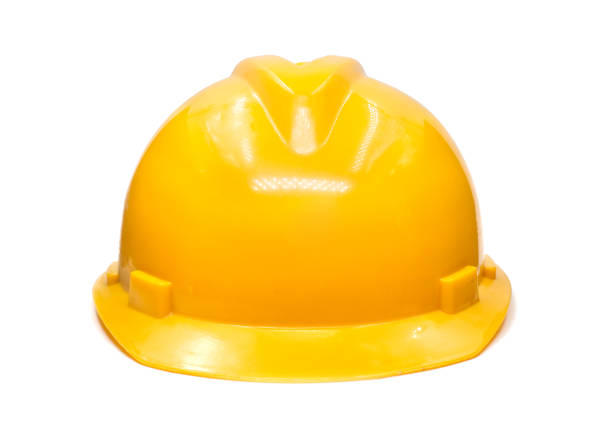 istock YELLOW HARD HAT SAFETY HELMET ON WHITE BACKGROUND 926930624