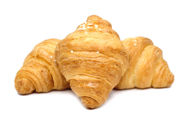 istock Fresh croissants on white background 926943332